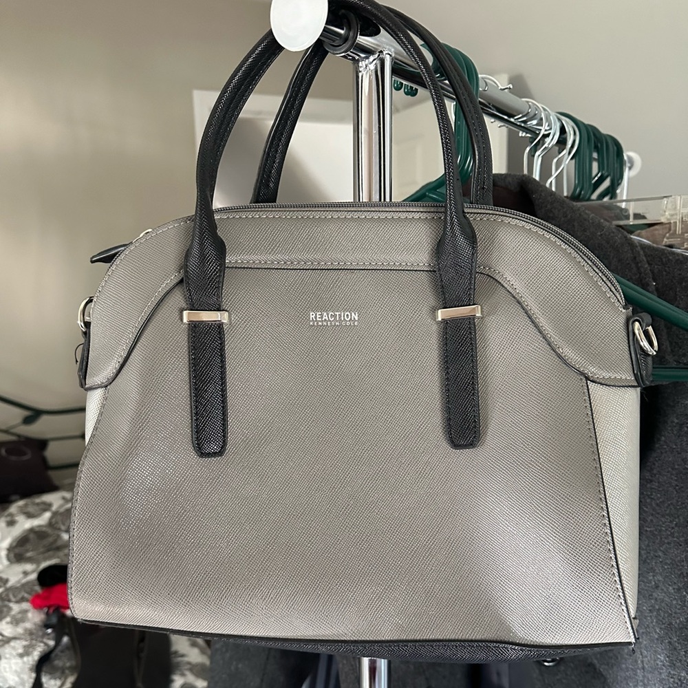 Kenneth Cole Reaction gray and black purse with removable strap.